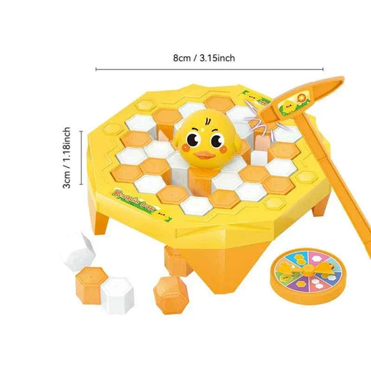 Yellow penguin ice-breaking tabletop game with smiling penguin and hex ice blocks.