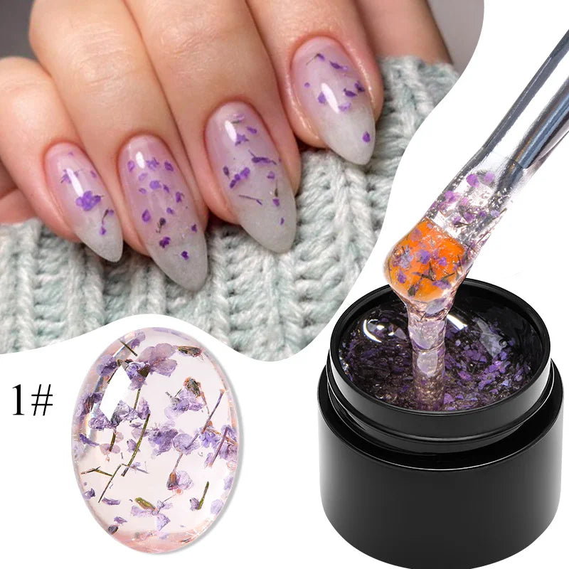 Lavender gel nail polish with purple dried flower nail art and gel bottle