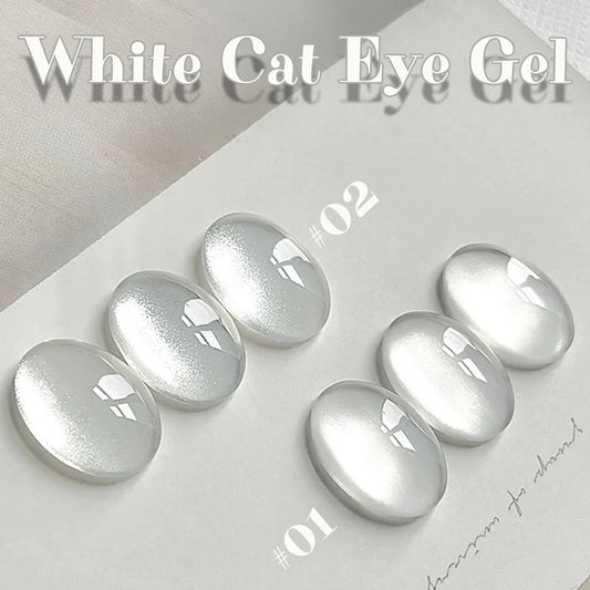 White cat eye gel nail polish with silver-white shimmer, glossy oval nails