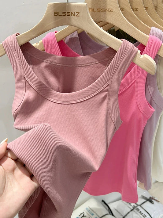 Women’s ribbed crew-neck tank top, pink, sleeveless knit with banded armholes.