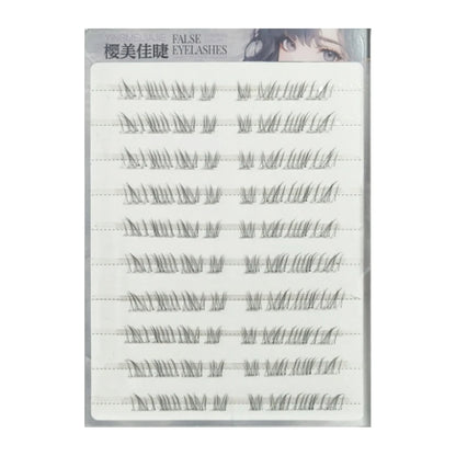 Single false eyelash card insert showing multiple rows of wispy lash clusters