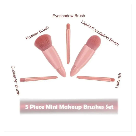 Mini makeup brush set with rose-pink handles in open travel case with mirror