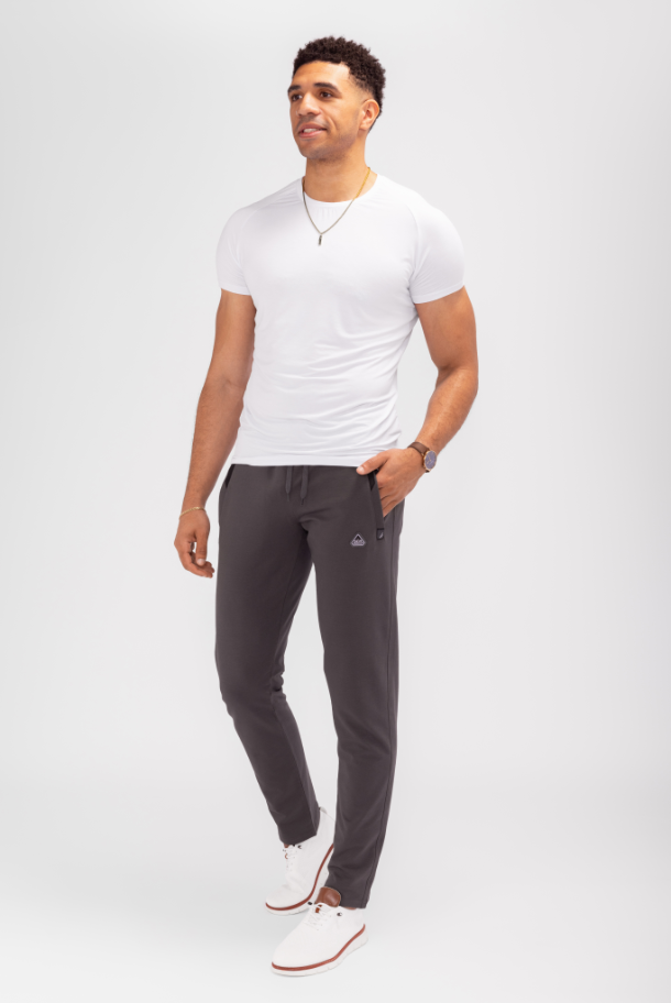 Dark gray tapered athletic sweatpants with elastic waistband and side pockets