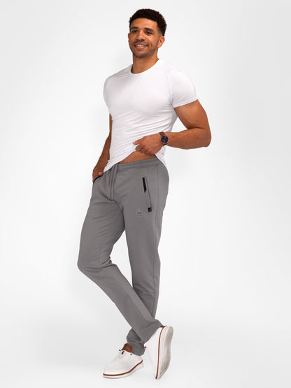 Dark grey tapered athletic sweatpants with drawstring waistband and side zip pocket