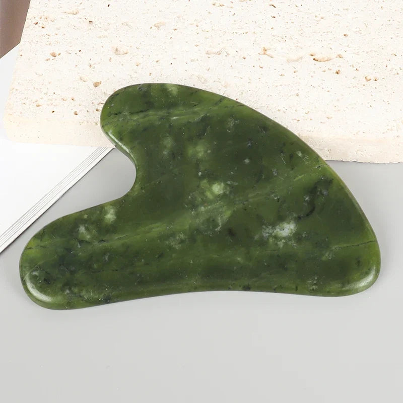 Facial gua sha stone massager, green marbled stone with rounded heart-shaped edge