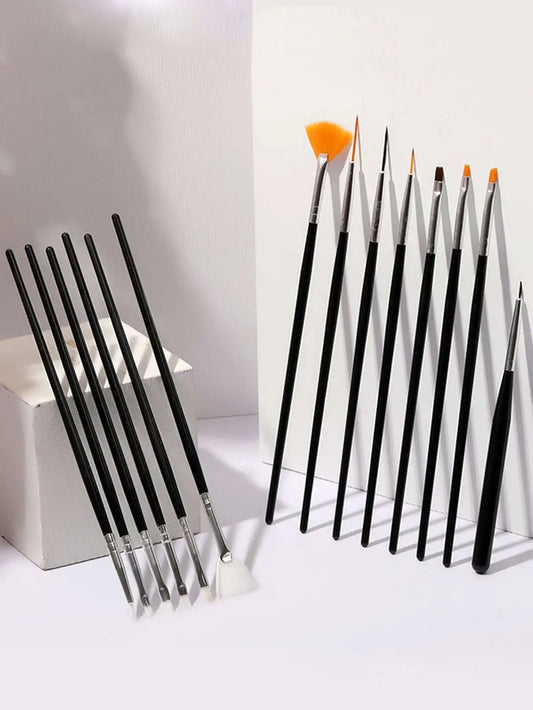 Nail art brush set with black-handled liner brushes and assorted orange bristle tips