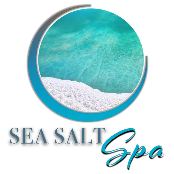 Sea Salt Spa compressed towels emblem with folded white towel and turquoise water