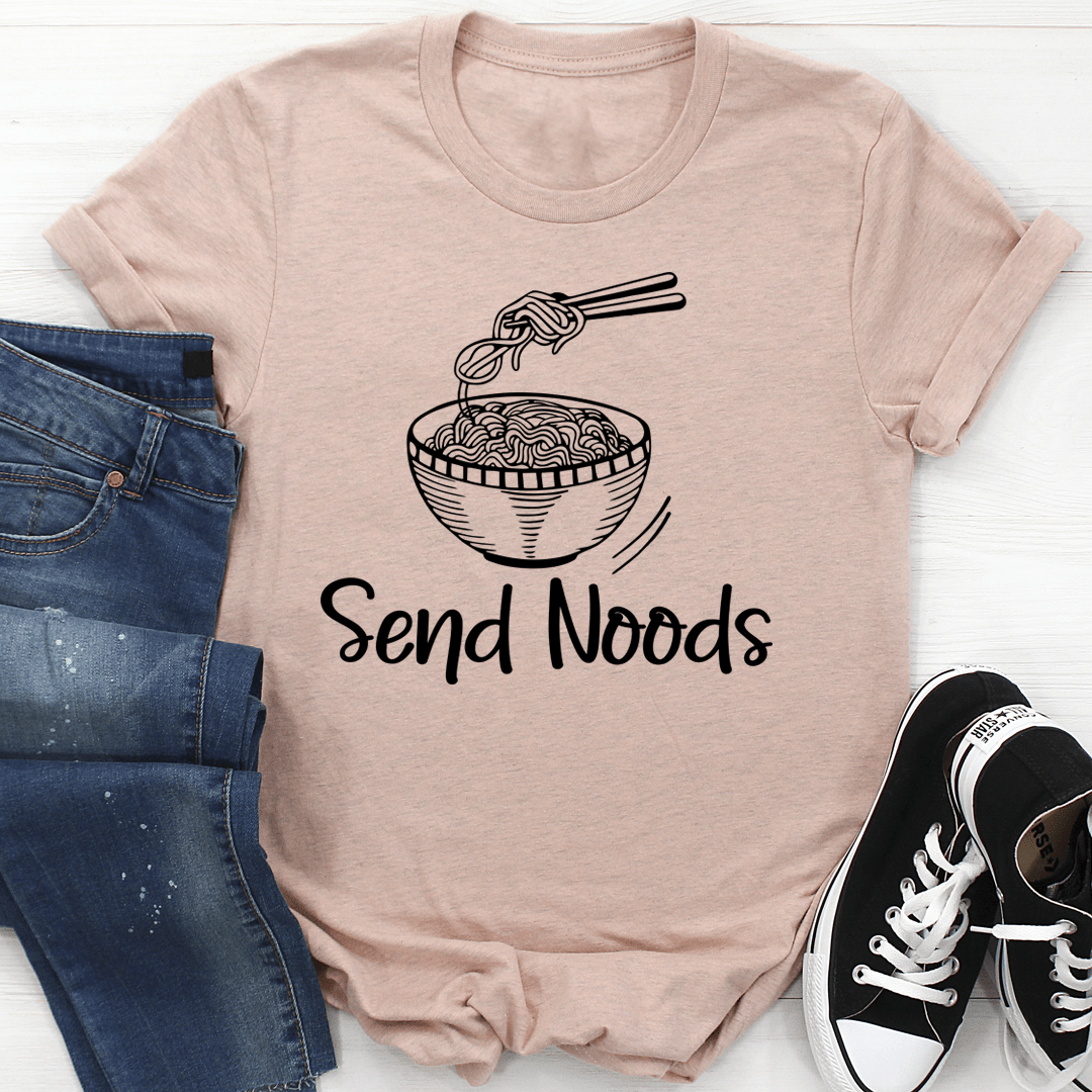 Noodle bowl graphic T-shirt in light peach with “Send Noods” text on front