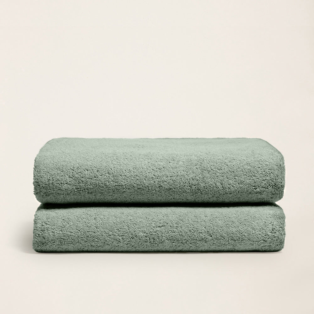 Plush cotton towels, mint green, two folded towels stacked horizontally