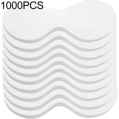 Stack of 1000 disposable white eye pads, curved under-eye shape
