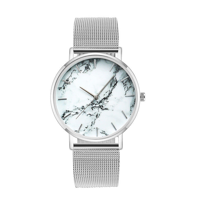Women’s silver mesh band quartz watch with white marble-pattern dial and silver-tone case