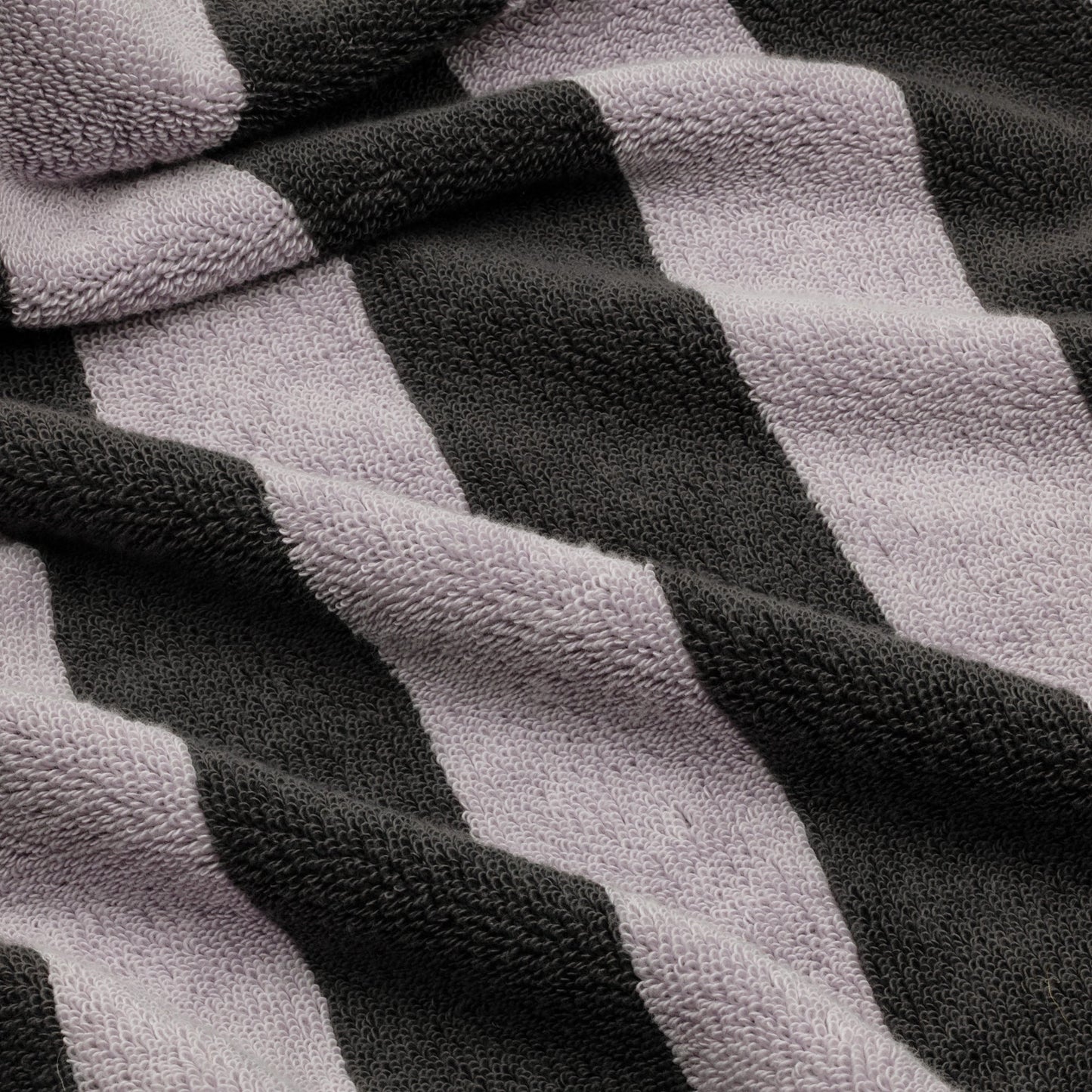 Australian cotton towel with lilac and dark charcoal wide stripe pattern