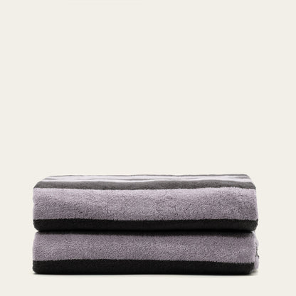 Australian cotton bath towel in soft lilac, neatly folded