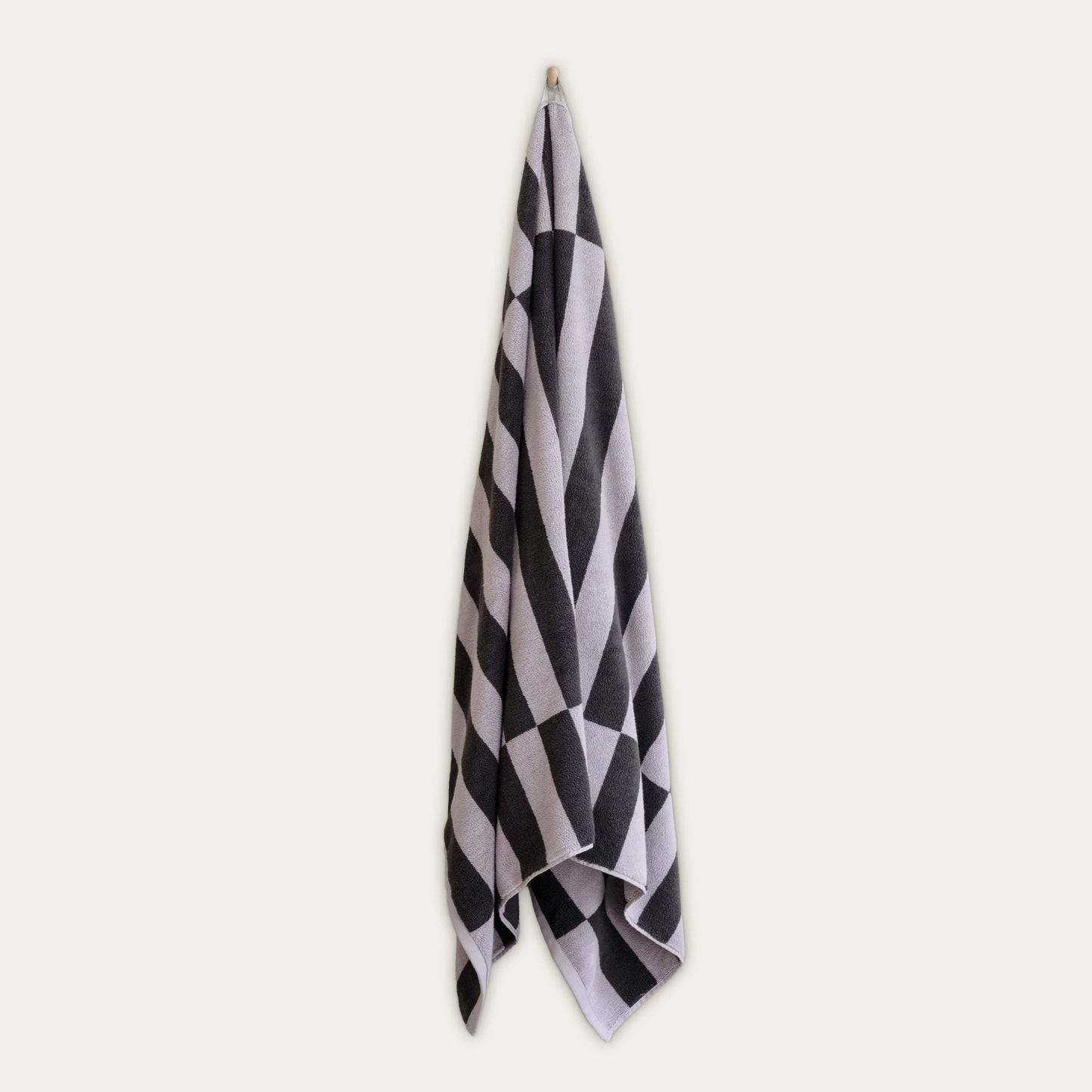 Australian cotton towel with lilac and dark charcoal checkered pattern