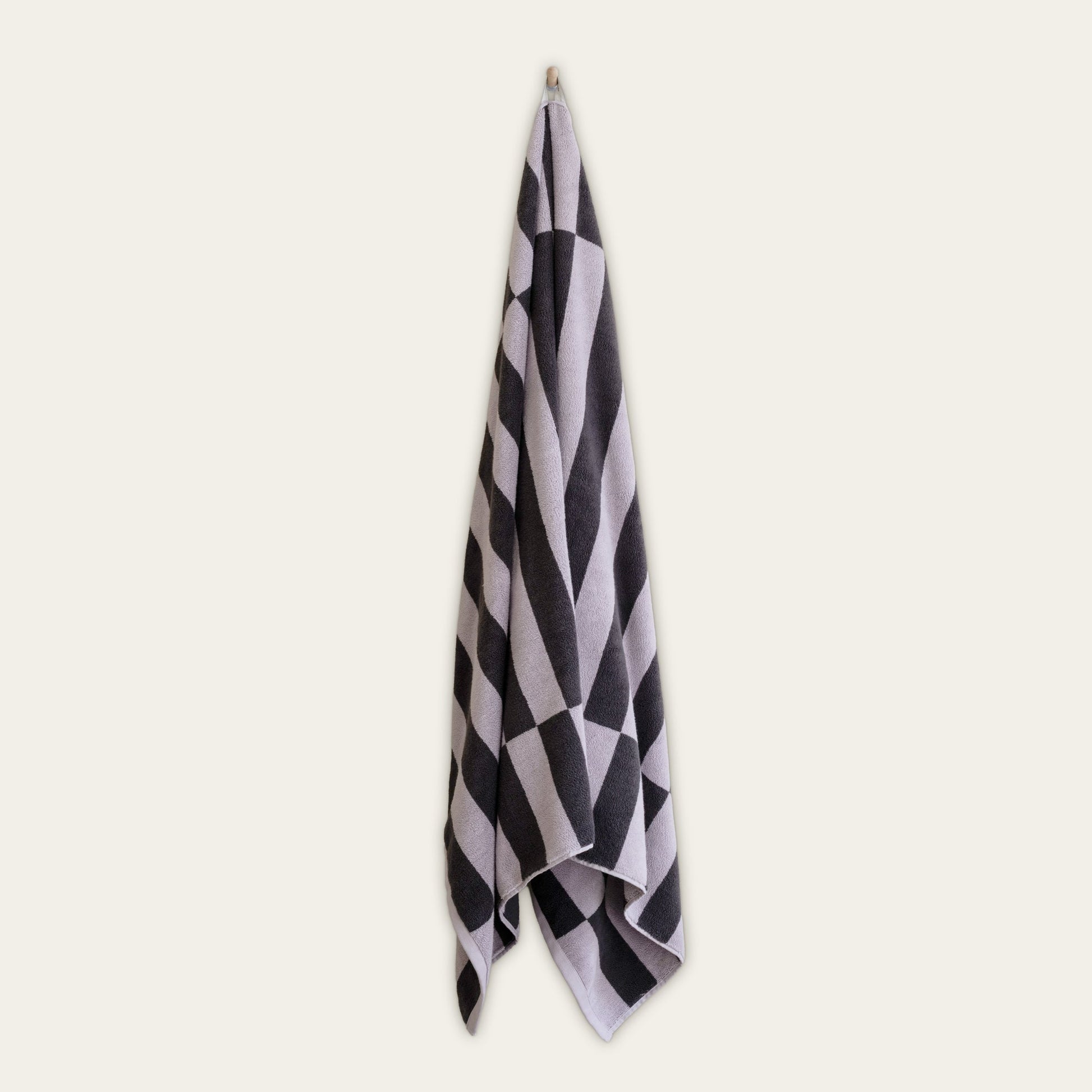 Australian cotton towel with lilac and dark charcoal checkered pattern
