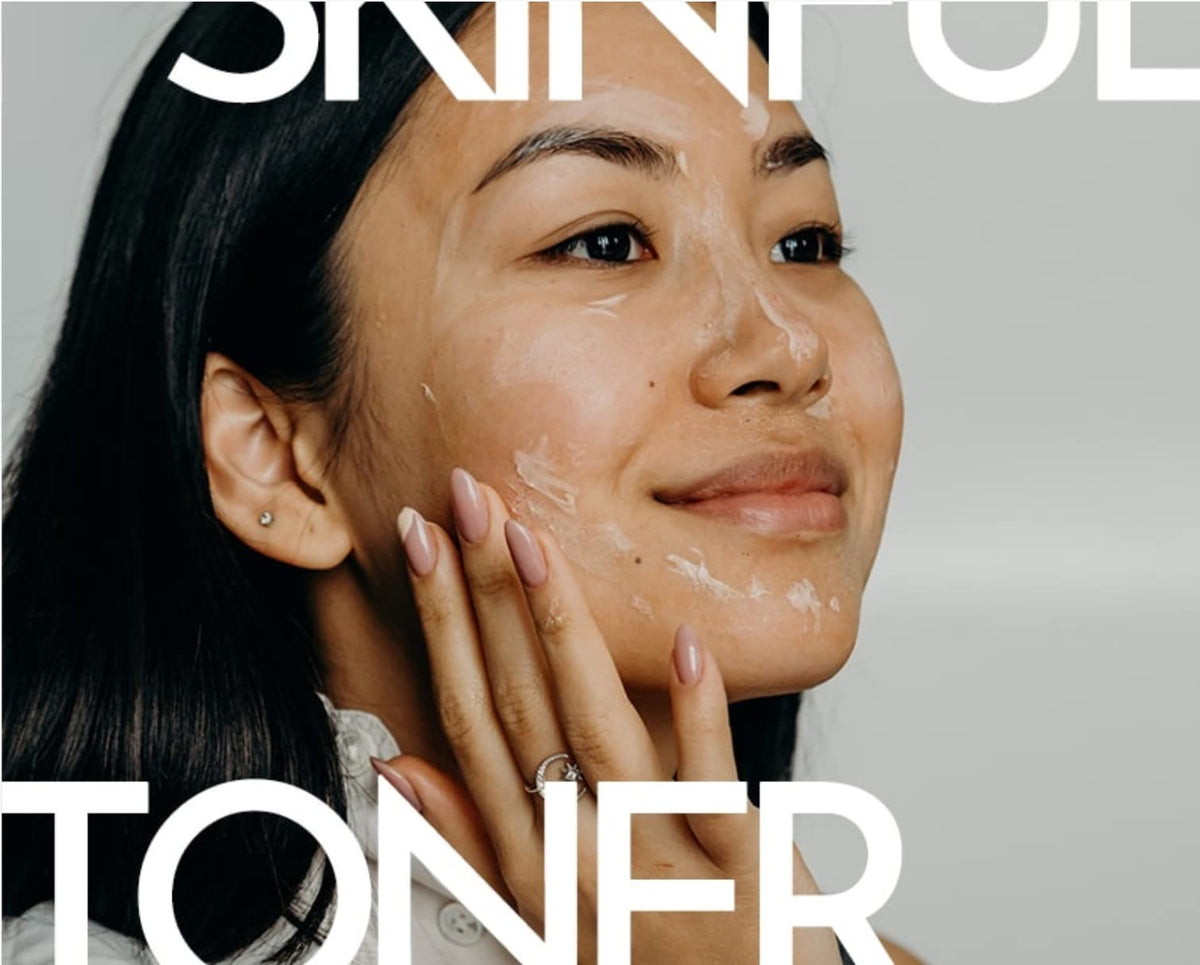 Facial toner mist applied to woman's cheek and hands, close-up skin care