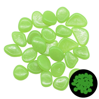 Glow-in-the-dark garden pebbles in light green, translucent oval pieces