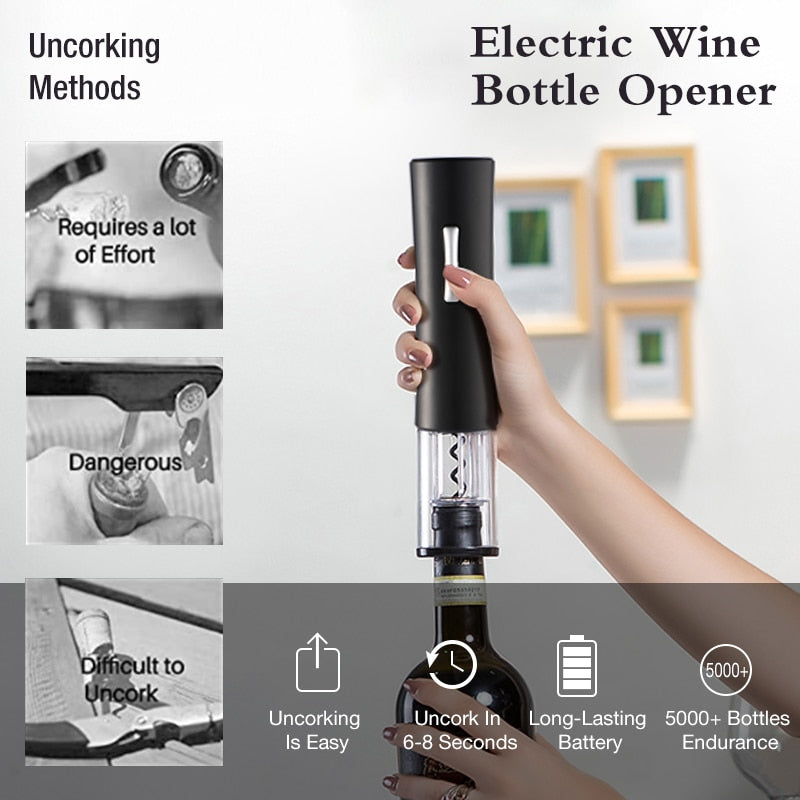 Black electric wine bottle opener held in hand above a glass and bottle