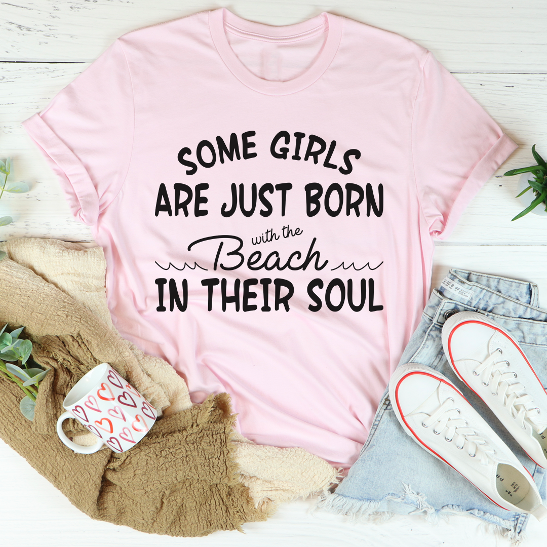 Pink crewneck T-shirt with black beach-soul quote graphic across front