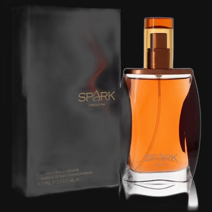 Liz Claiborne Spark men's cologne bottle with orange liquid and gold sprayer