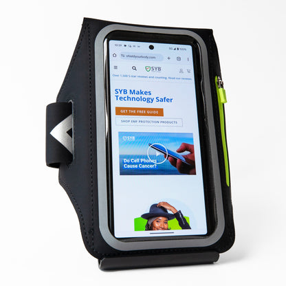 Black armband phone pouch with clear front window and green zipper pull