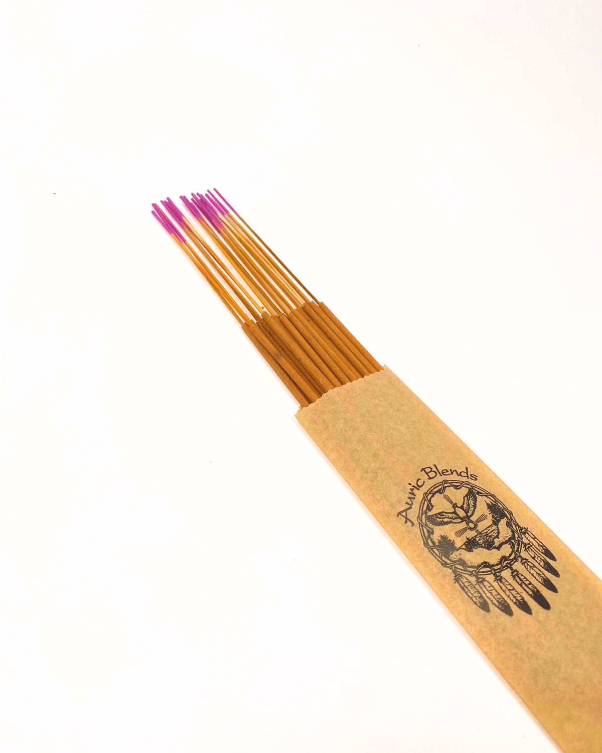 Incense sticks bundle with brown paper sleeve, tan sticks and pink tips