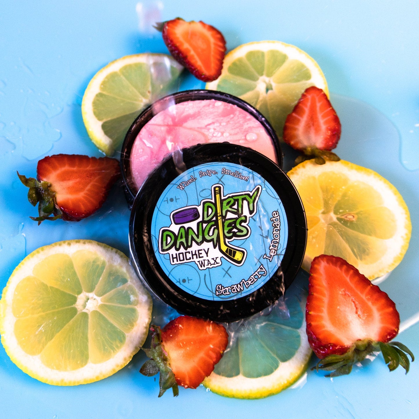 Hockey stick wax tin with round black lid and colorful Dirty Danges label.
