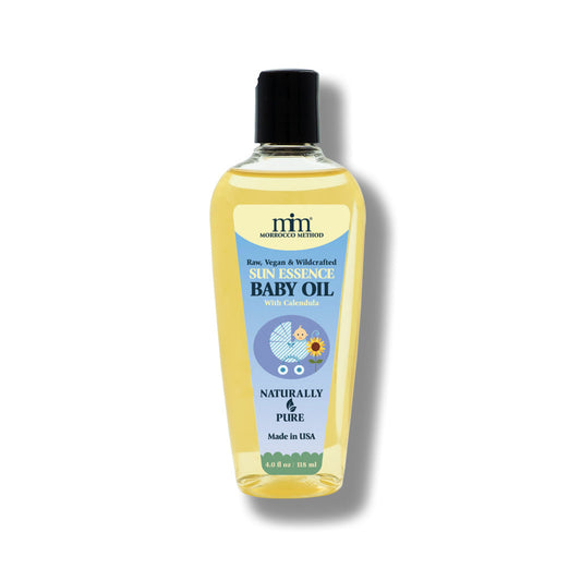 Baby oil bottle with yellow liquid and black cap, Naturally Pure label