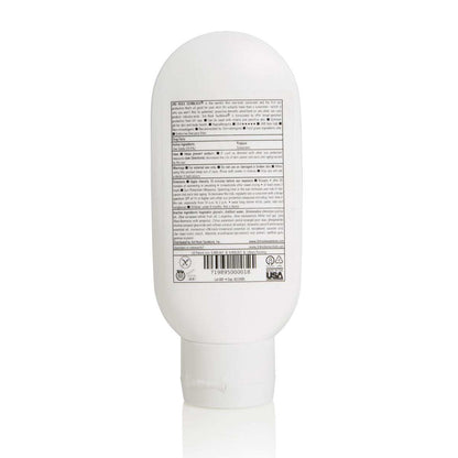Sunscreen bottle back label with ingredient panel, barcode, and icons.