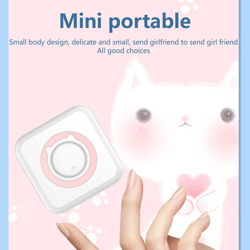 Mini portable thermal sticker printer with pink accent button, compact square design