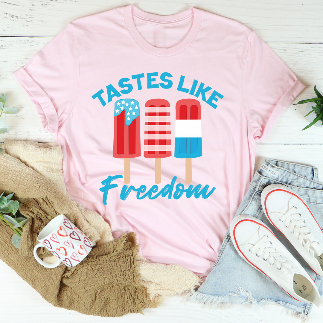 Pink crewneck T-shirt with colorful popsicle graphic and teal "Freedom" script