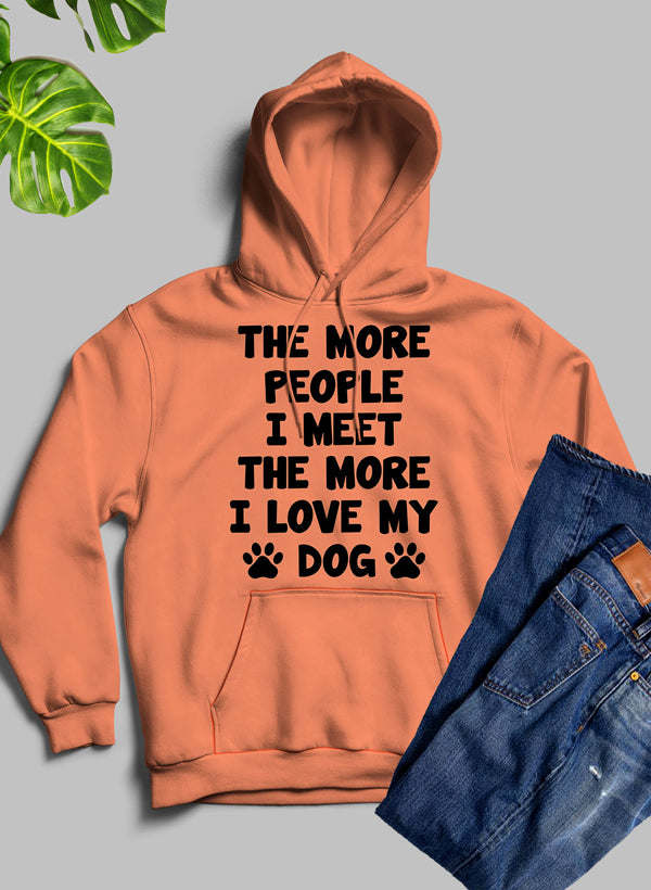 Orange hoodie sweatshirt with slogan print and dog paw graphic, front view.
