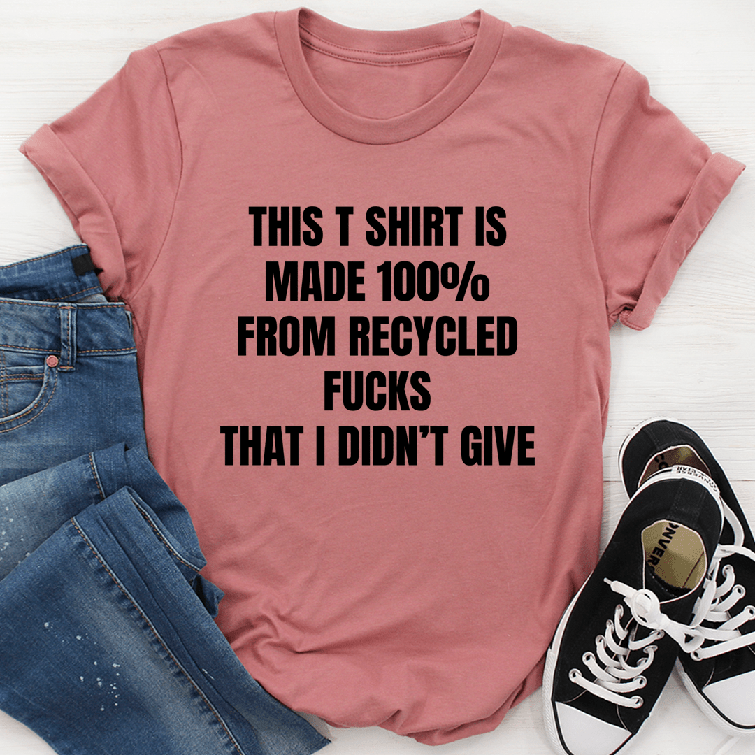 Mauve crew-neck T-shirt with large black slogan: THIS T SHIRT MADE 100% RECYCLED