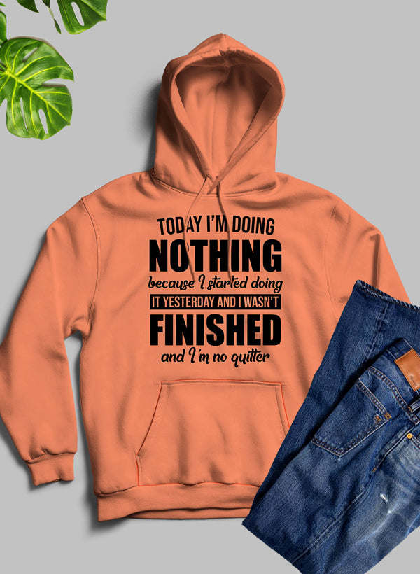 Orange pullover hoodie with front slogan graphic and kangaroo pocket