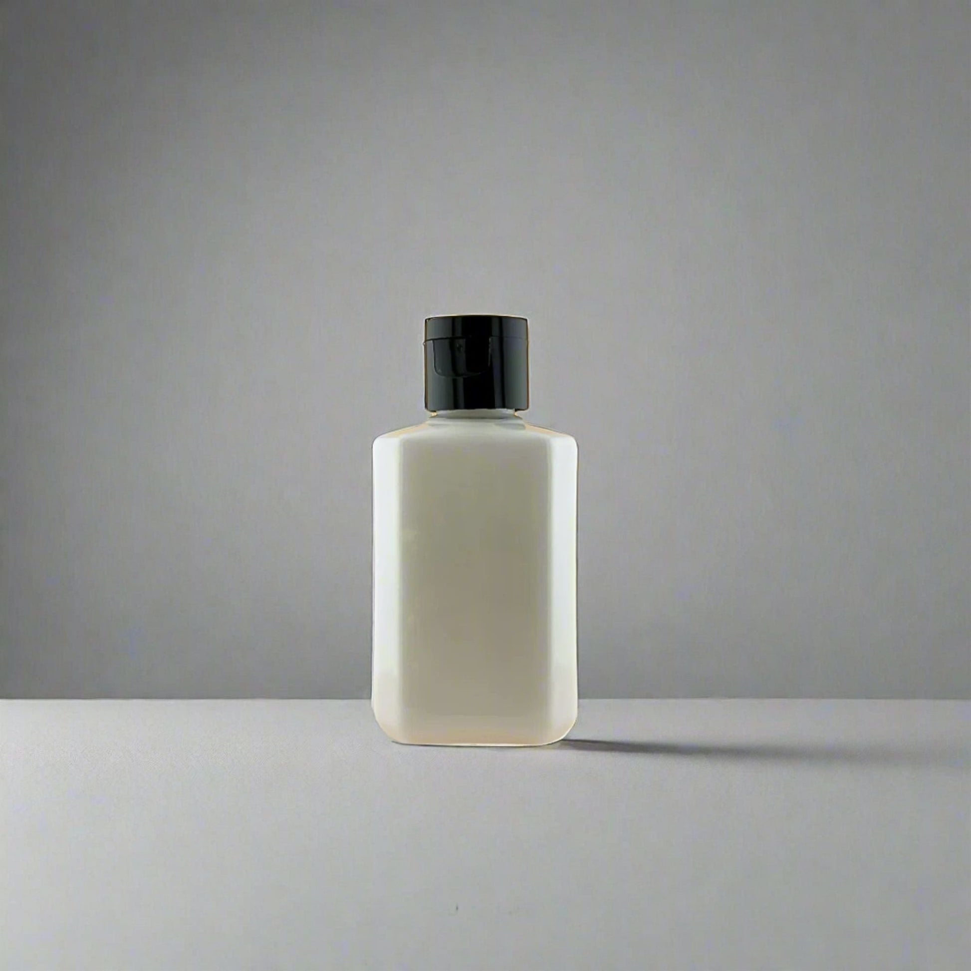 Lotion bottle with black pump dispenser, front-facing bottle view