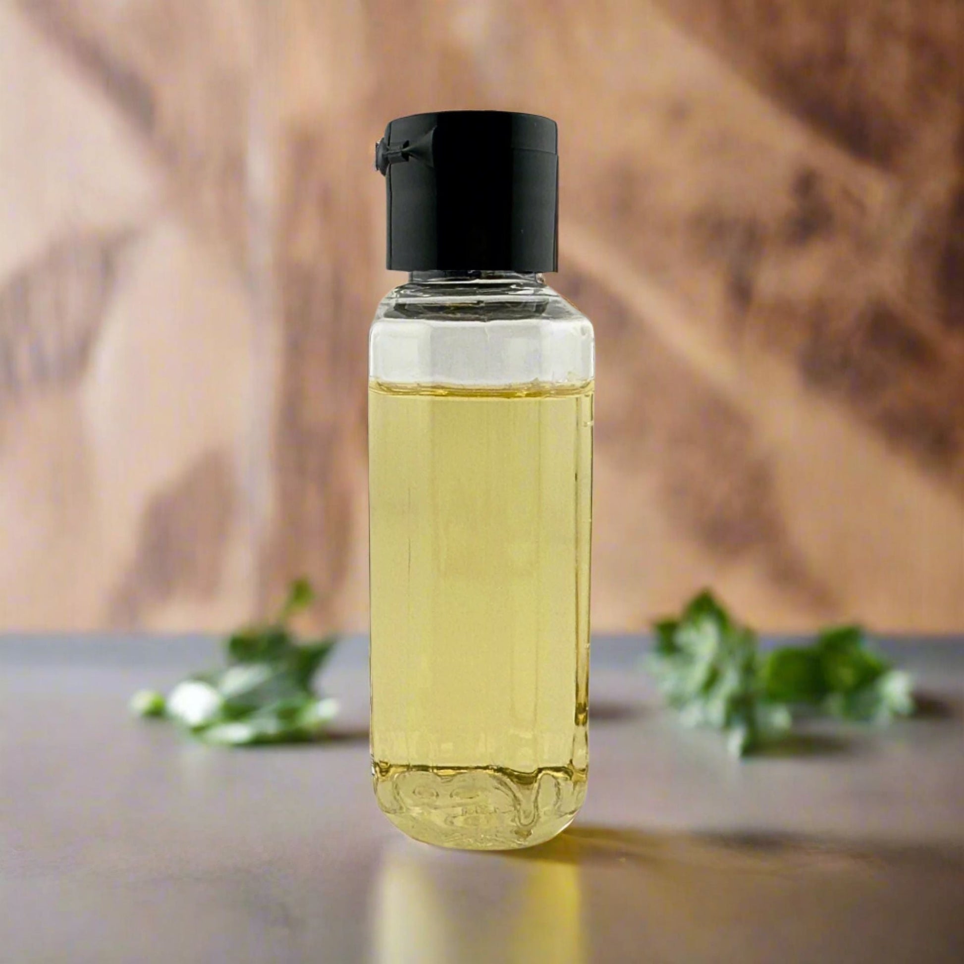 Liquid hand soap bottle with black pump, clear yellow liquid, side view