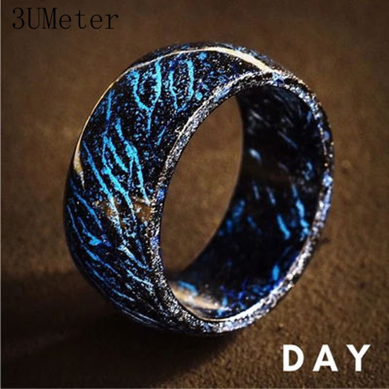 Luminous dark blue ring with speckled texture and bright blue glow