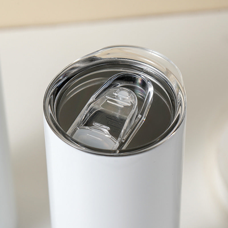 White stainless tumbler with open clear lid and clear plastic straw insert