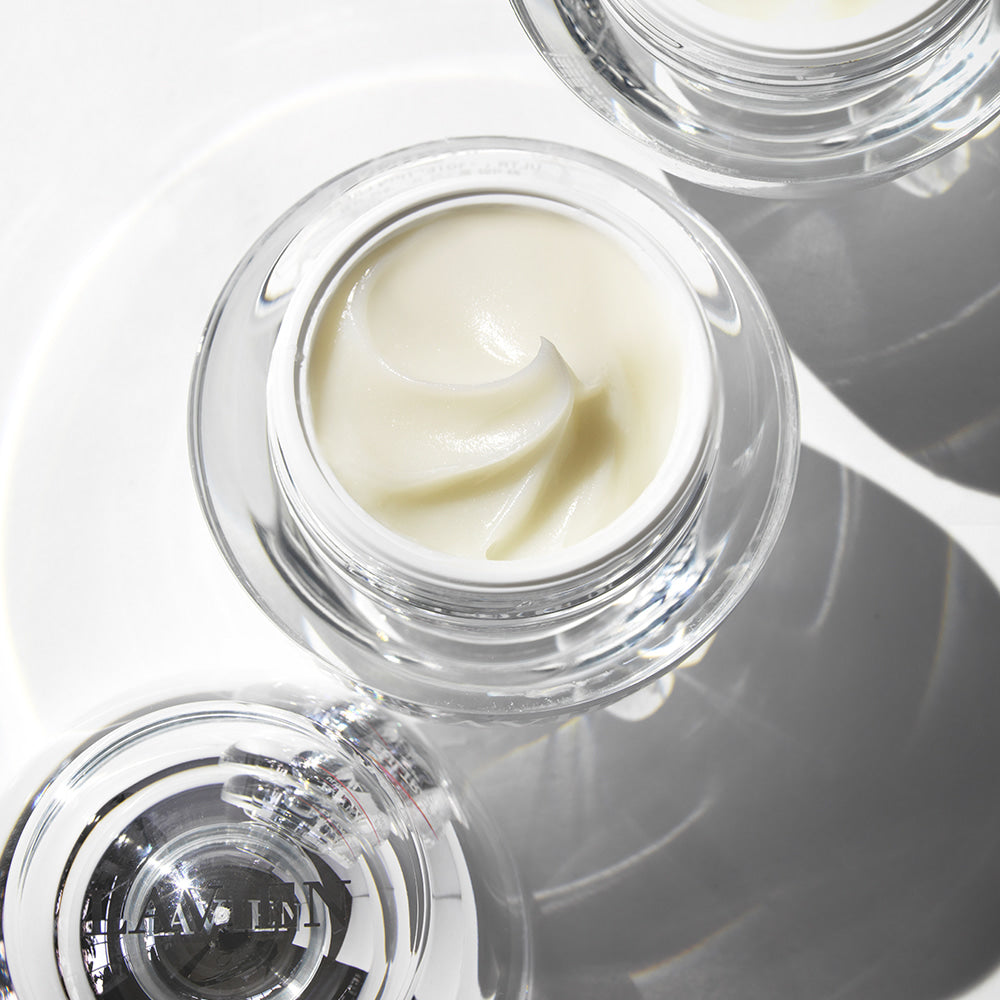 Ultra Protection Cream jar open, showing pale cream inside