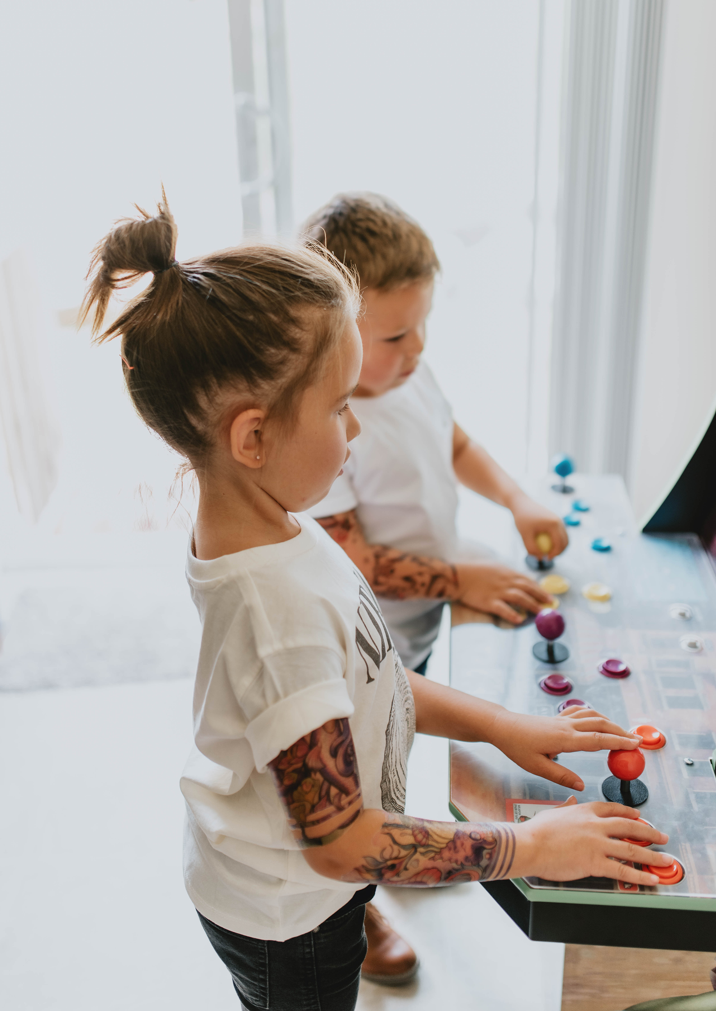 Temporary kids under-the-sea tattoo sleeve on child’s arm during play
