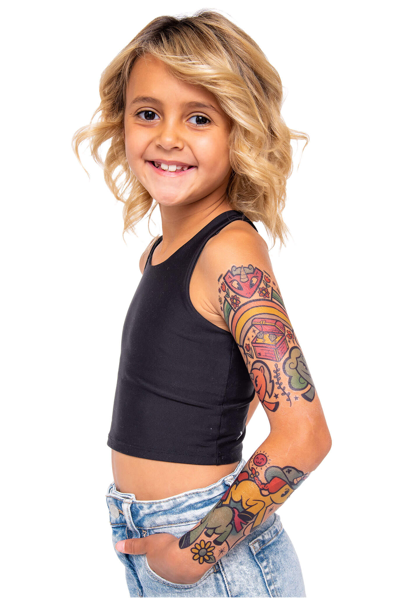 Temporary unicorn tattoo on child's forearm and upper arm, colorful full-sleeve design