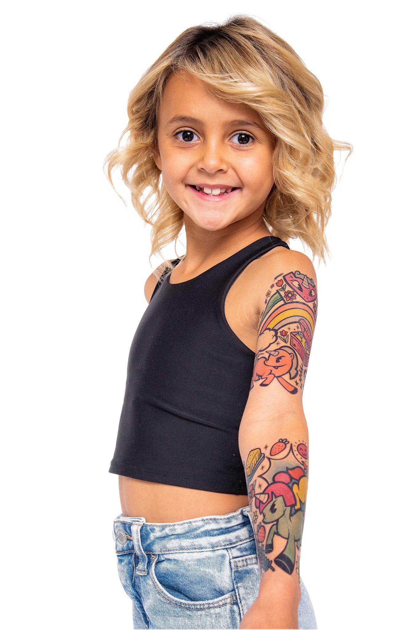 Temporary unicorn tattoo on child's arm with colorful cartoon animals and flowers