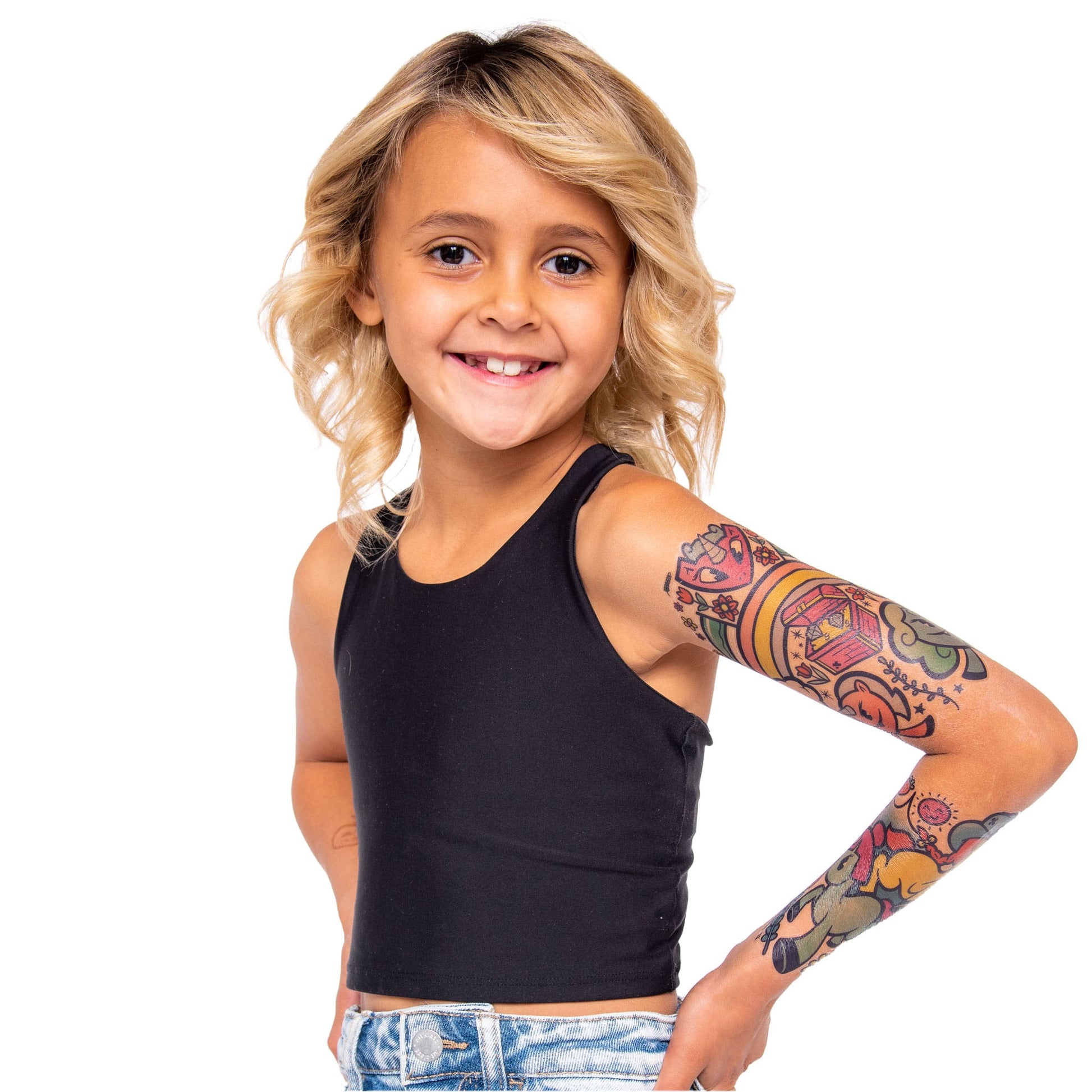 Temporary unicorn tattoo sleeve on child's upper arm and forearm, bright multicolor art