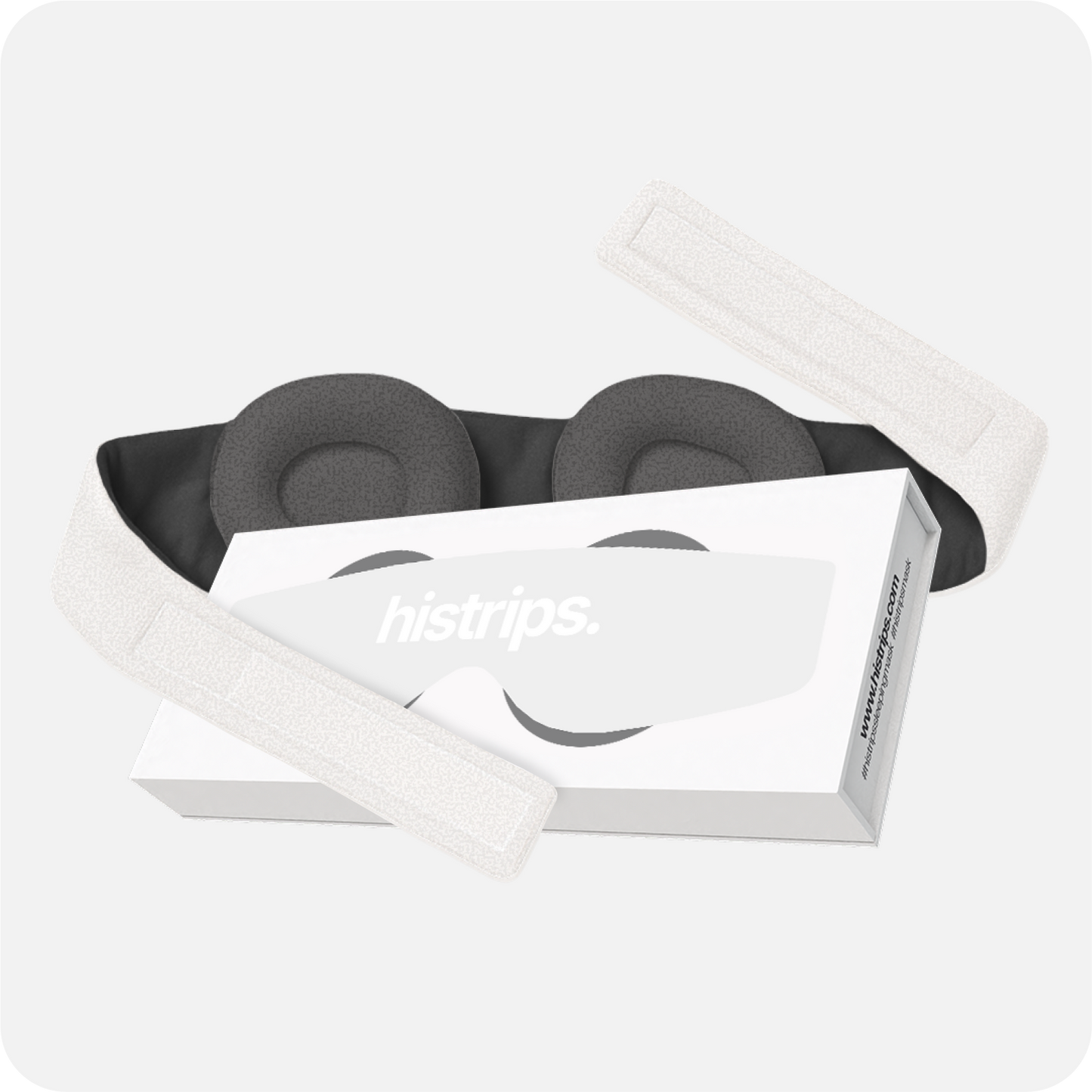 Eclipse sleep mask with contoured dark fabric panels and adjustable strap