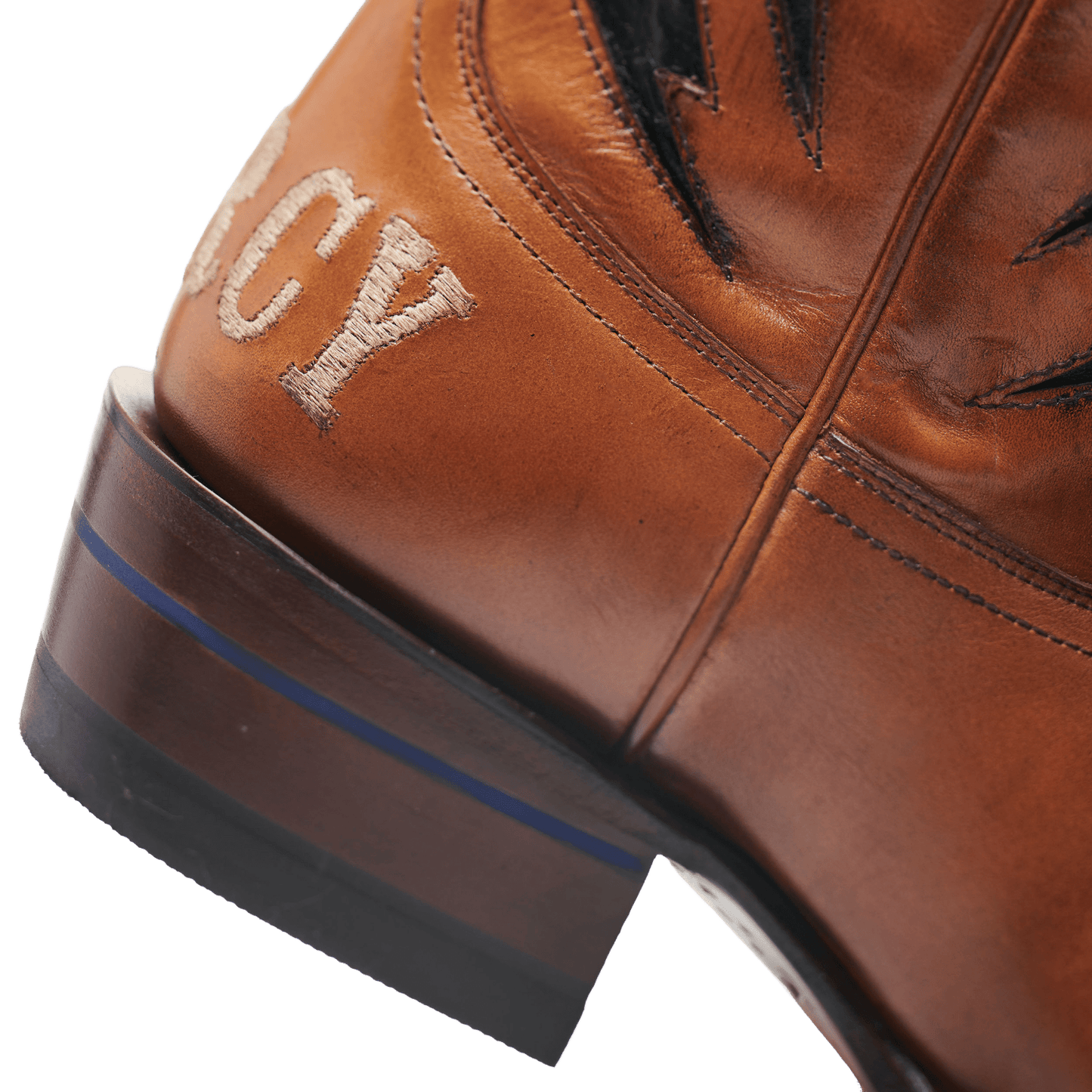Brown cowboy boot with blue-trimmed sole edge and star-and-lightning stitching