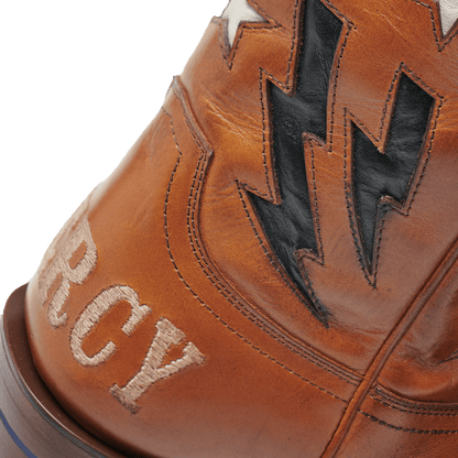 THE BFG II cowboy boots, tan leather with black lightning paneling and HAVIES stitching