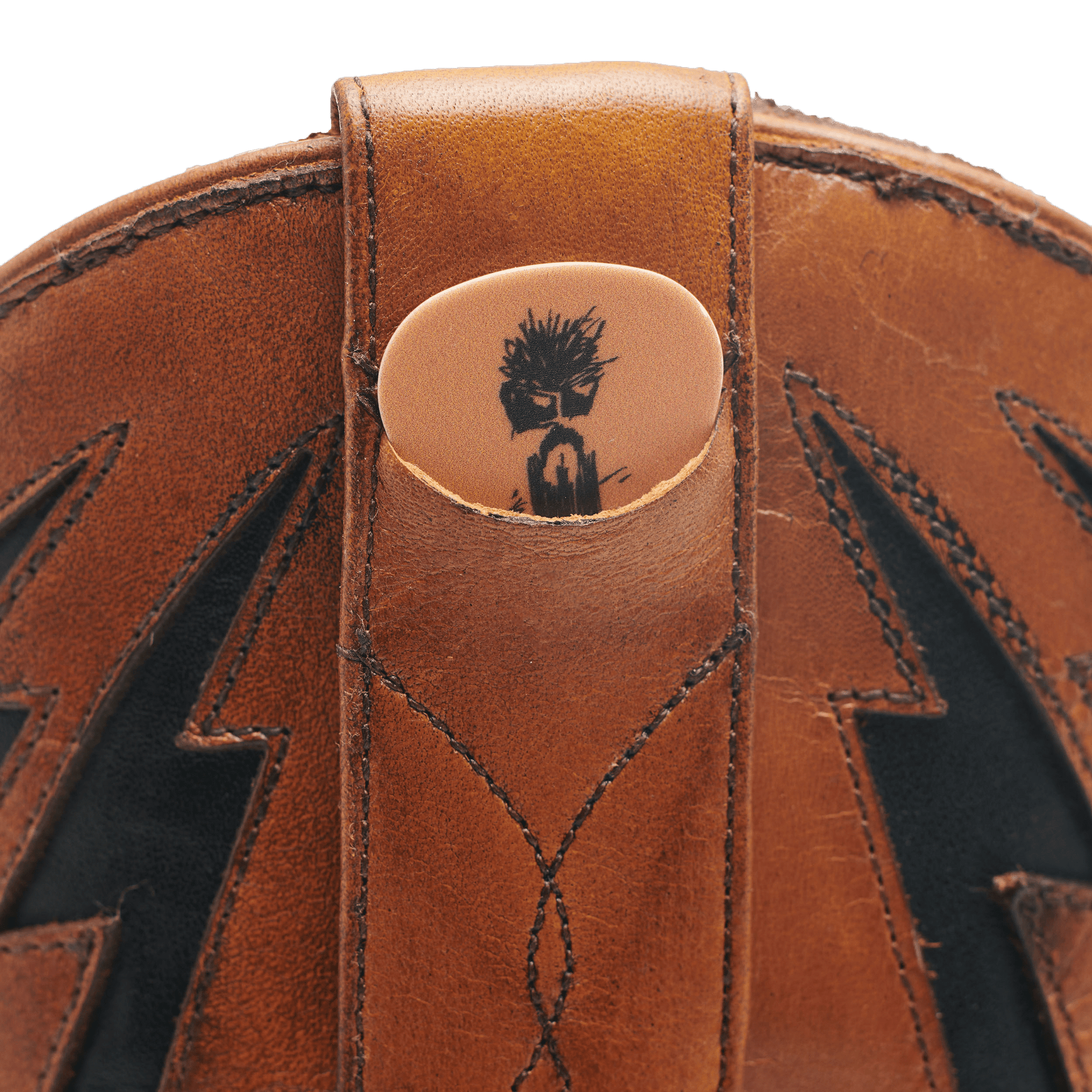 Brown cowboy boot with round ankle patch and star-and-lightning embroidery