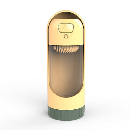 Portable dog water bottle in yellow with flip-top lid and built-in drinking spout