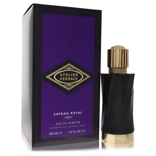 Unisex eau de parfum bottle with gold striped cap, displayed beside purple box