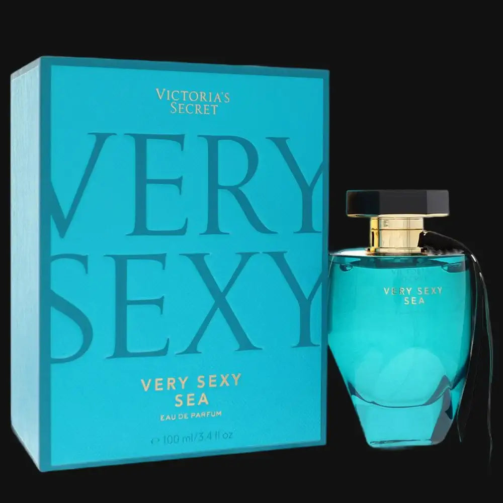 Women's perfume bottle, teal glass and black cap, shown with teal product box
